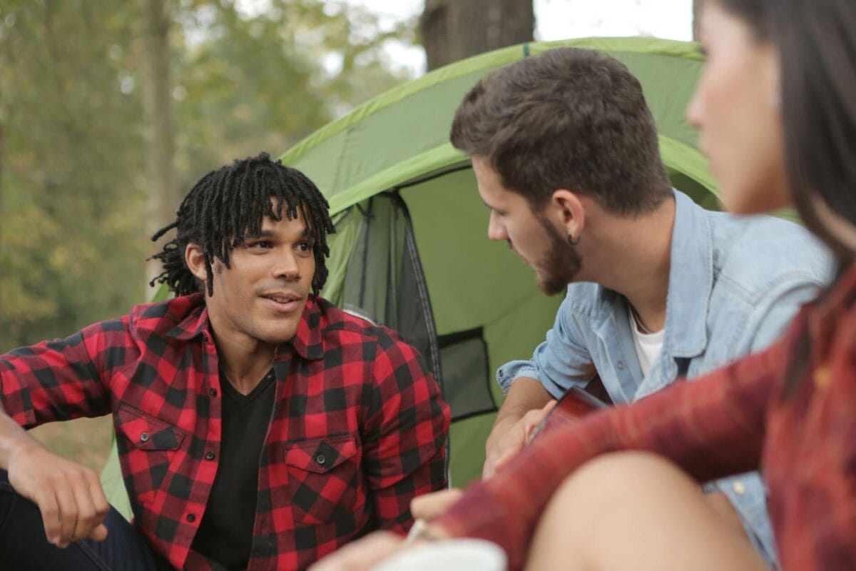 people-speaking-while-camping