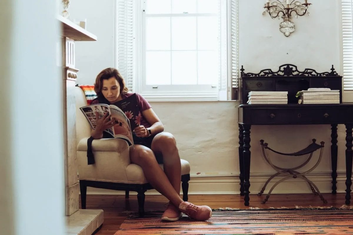 woman reading a magazine