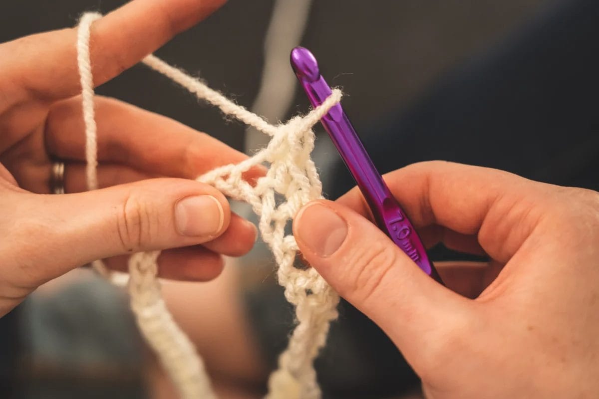 woman is knitting