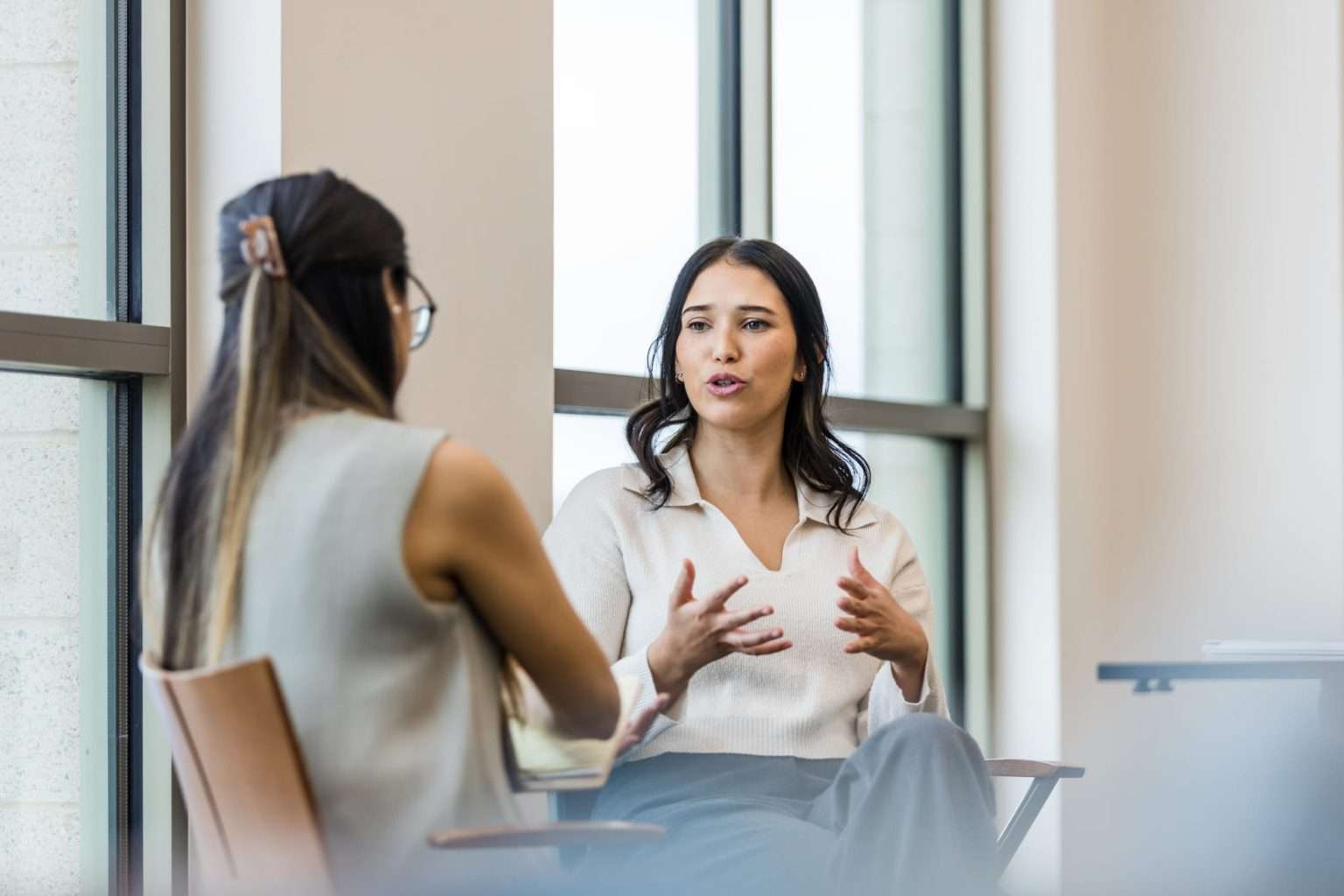 two women are discussing